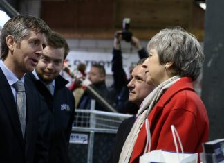 John Williams, the managing director of Ifor Williams Trailers, with Prime Minister Theresa May and Welsh Secretary Alun Cairns.